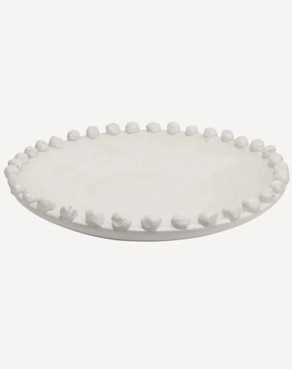 large white terracotta platter with decorative baubles